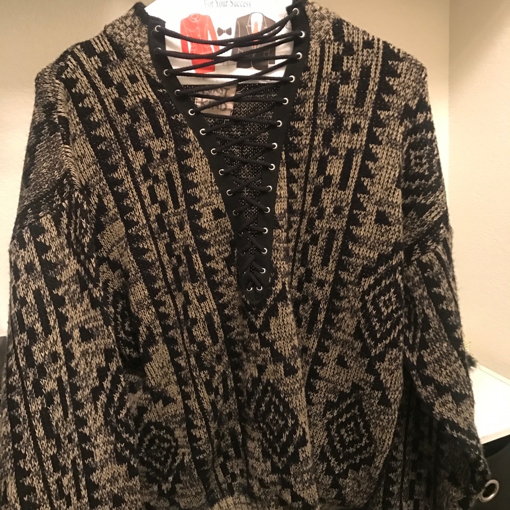 LF furst of a kind lace up sweater
